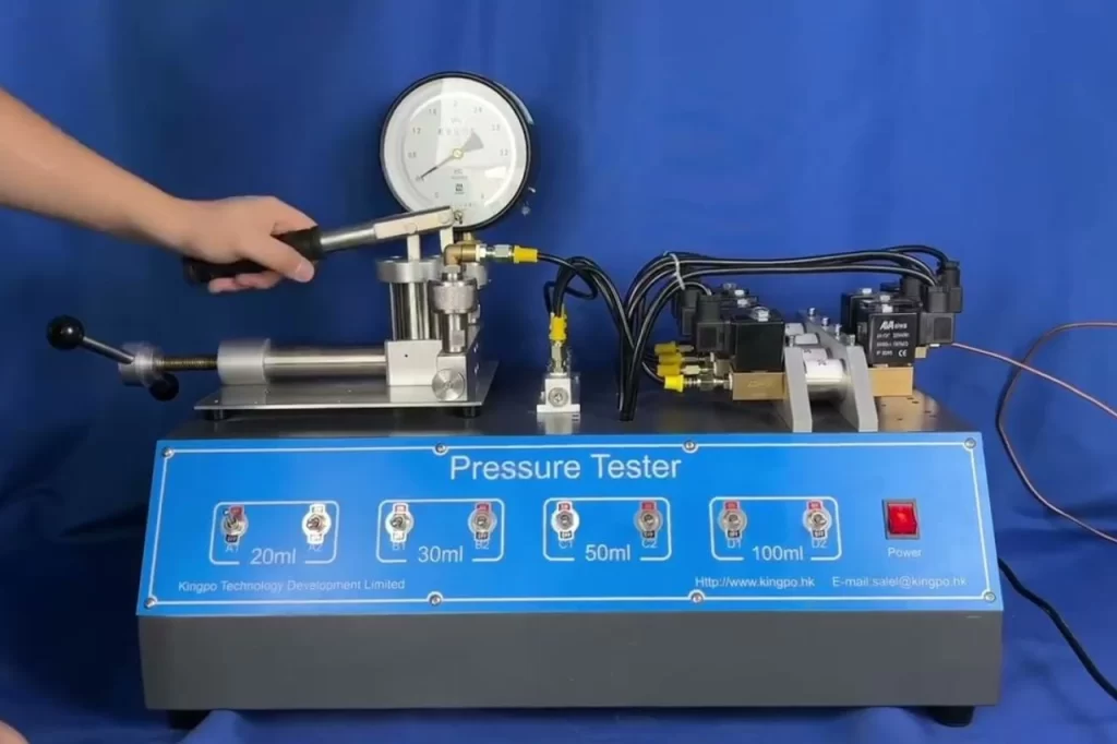 Experience precision with our advanced hydraulic pressure testing unit—featuring a pressure gauge, multiple measurement settings, and manual lever control, all set against a sleek blue backdrop for professional-grade performance.