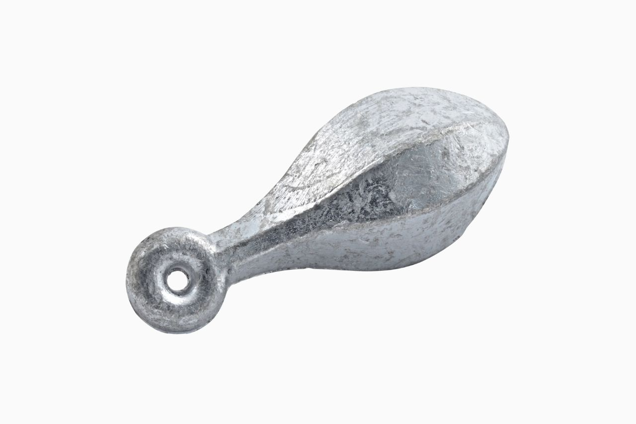 A silver fishing weight in a teardrop shape with a small loop at one end for attaching to fishing line.